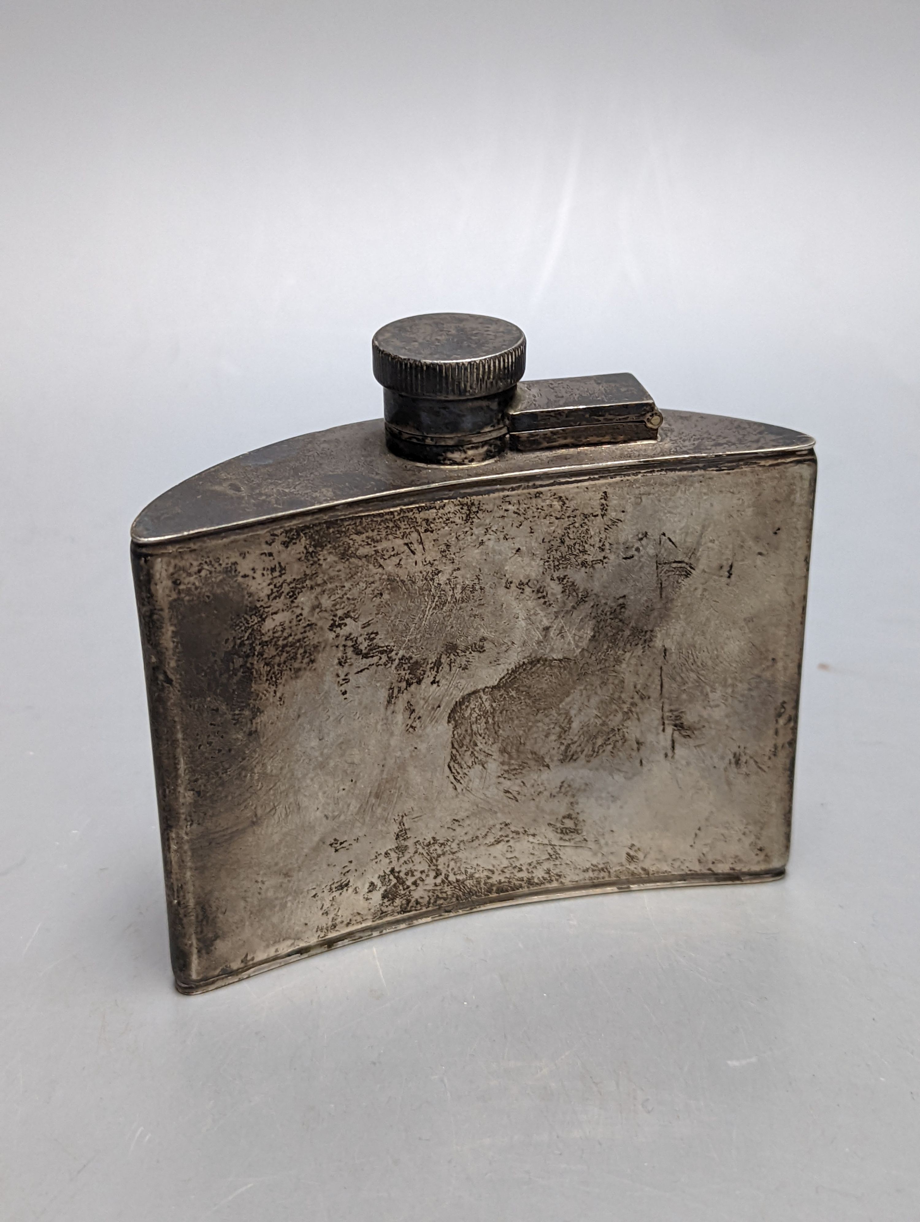 A George V silver demi-lune shaped hip flask, Birmingham, 1929, width 97mm, gross 144 grams.